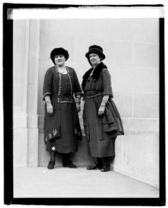 Two unidentified women outside city building LOC npcc.05082