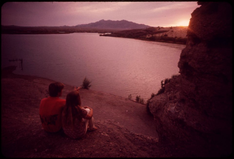 Two-young-people-overlook-the-colorado-river-from-castle-rock-a-promontory-north-of-lake-havasu-city-may-1972 6990347384 o