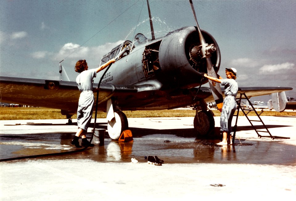 Two WAVES washing a North American SNJ at Naval Air Station Jacksonville, circa 1944 (80-G-K-15001)