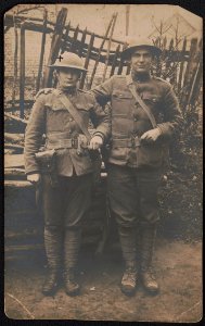 Two unidentified soldiers, one named Lester, in uniforms and helmets with handguns LCCN2018645945