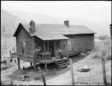Typical house and back porch scene. This is home of Rufus Sergent, miner, son of Blaine Sergent. P V & K Coal... - NARA - 541329