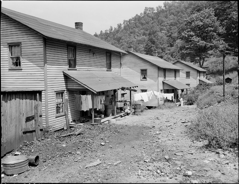 Typical eight room, two family houses. Each half of the house rents for from $10 to $11 monthly plus $1 for water an... - NARA - 541059