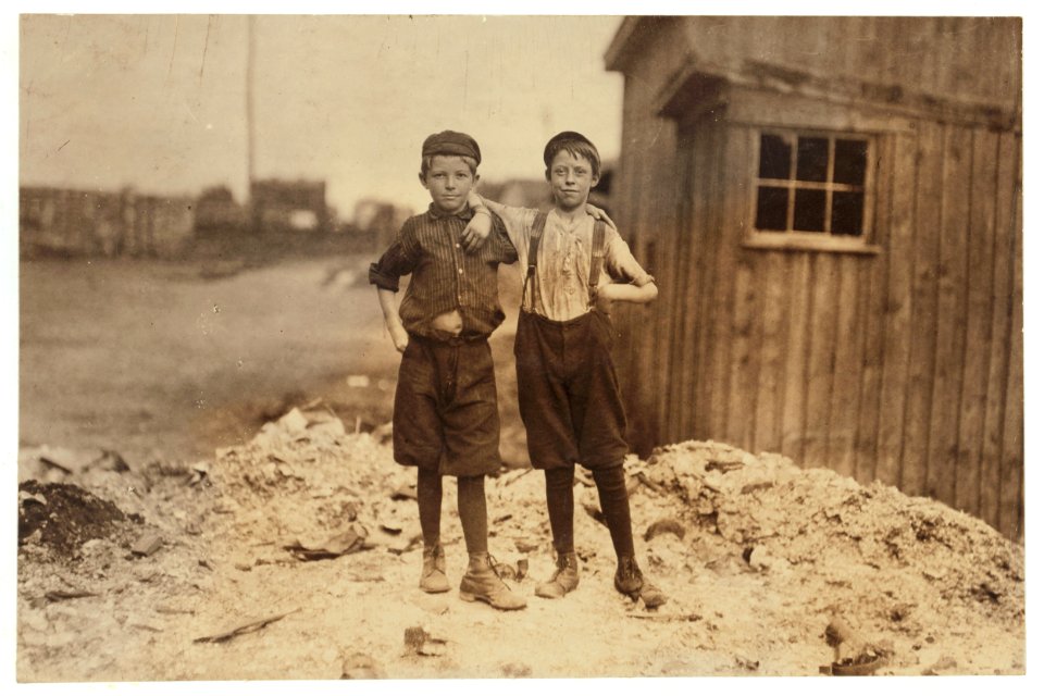 Two young carrying-in boys in Alexandria (Va.) Glass Factory. Frank Clark (on left) 702 N. Patrick St., could neither read nor write, having been to school only a few weeks in his life. Two LOC nclc.01296