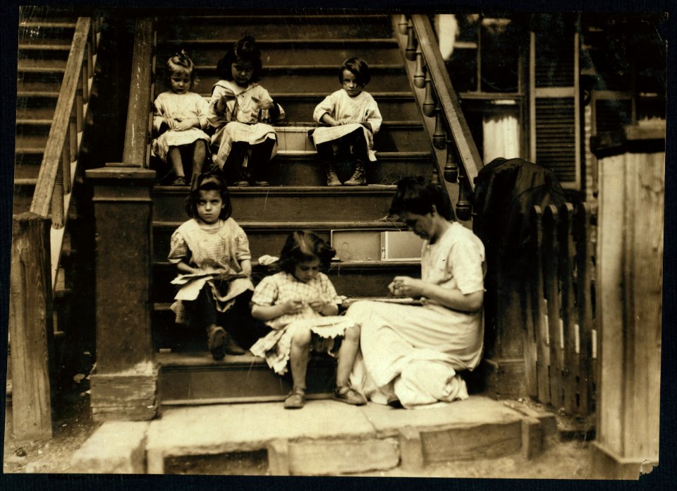 Typical group of workers on tags. Steps of Mrs. Dolan, 279 Highland Street, Roxbury, Mass. LOC nclc.04238