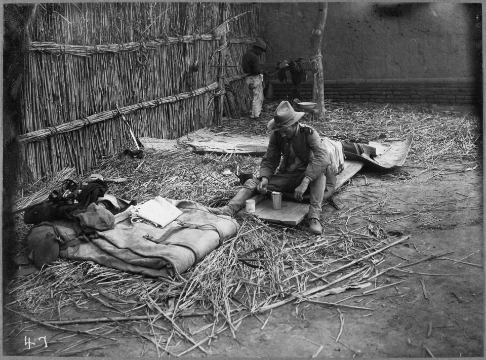 Typical sleeping quarters of an officer in China. Photo of Lieutenant (now Captain) Stamford after the battle of Yang Si - NARA - 530701