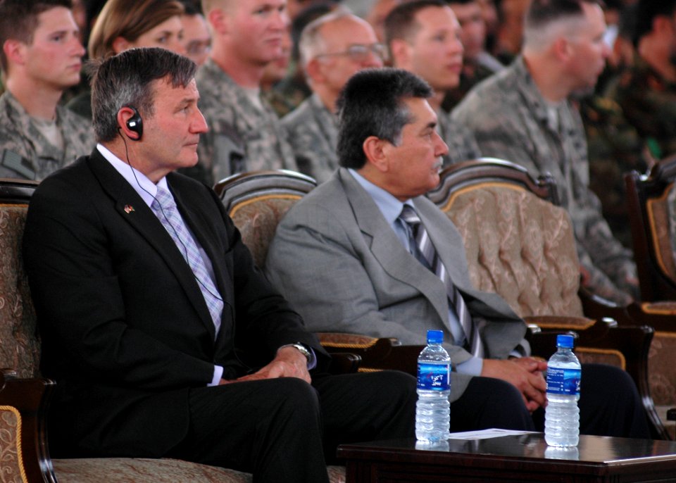 U.S. Ambassador for Afghanistan, Karl Eikenberry and General Mohammad Amayoon Raizee, Deputy of Ministry of Defense, listen to a speech a speech (4723939815)
