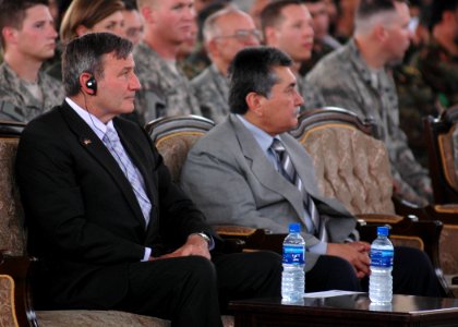 U.S. Ambassador for Afghanistan, Karl Eikenberry and General Mohammad Amayoon Raizee, Deputy of Ministry of Defense, listen to a speech a speech (4723939815) photo
