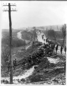 U.S. Army in France- Line of soldiers on muddy road LCCN2003690390