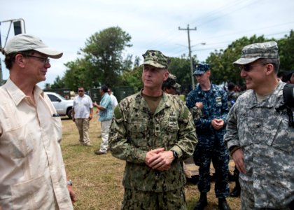 U.S. Ambassador to Honduras James D. Nealon, left, speaks with U.S. Navy Cmdr. Jeffrey V. Morganthaler, center, the commanding officer ashore of Southern Partnership Station (SPS) 2014, and U.S. Army Col. Steven 140901-N-QY430-465