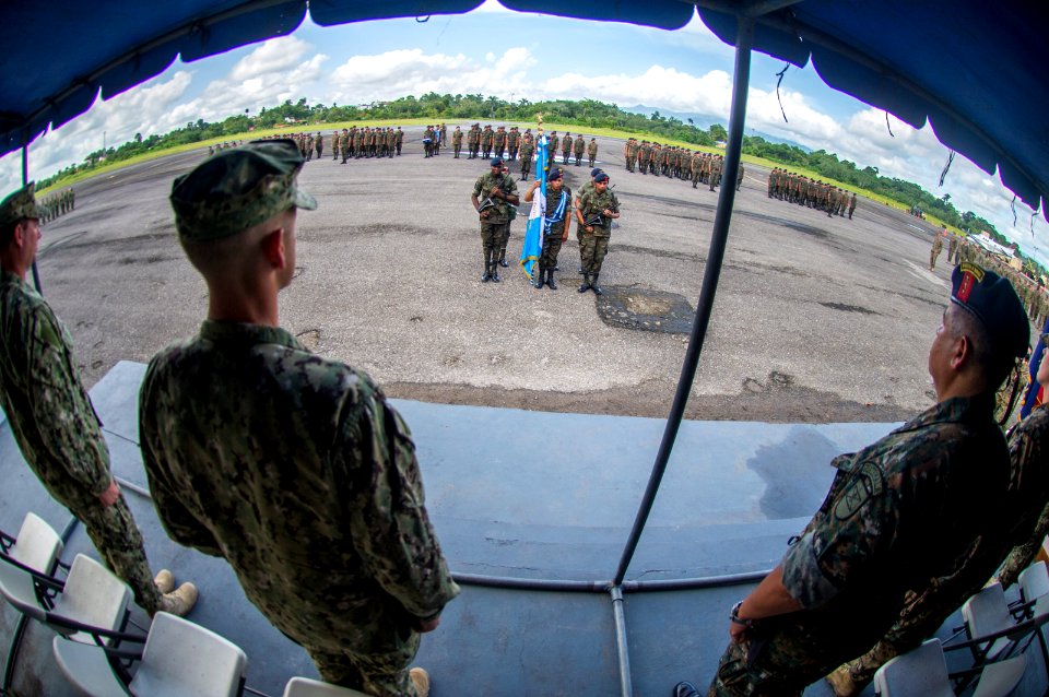 U.S. and Guatemalan service members attend a closing ceremony at the Guatemalan Marine Brigade base in Puerto Barrios, Guatemala, Aug. 22, 2014, as part of Southern Partnership Station (SPS) 2014 140822-N-XQ474-145