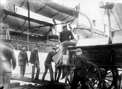 U.S. Marines load rifles aboard USS Prairie, in March 1911 (ggbain.09401)