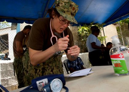 U.S. and Guatemalan service members, Ministry of Education teachers and Ministry of Health doctors and nurses tend to Guatemalan patients at a medical civic action project (MEDCAP) in Puerto Barrios, Guatemala 140823-N-QY430-363