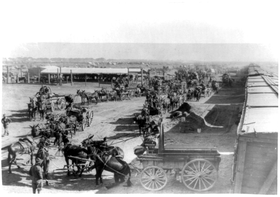 U.S. Army Punitive Expedition after Villa, Colonia Dublan, Mexico, 1916. American Headquarters- Unloading supplies from train which has come from Juarez on the border LCCN2002718568