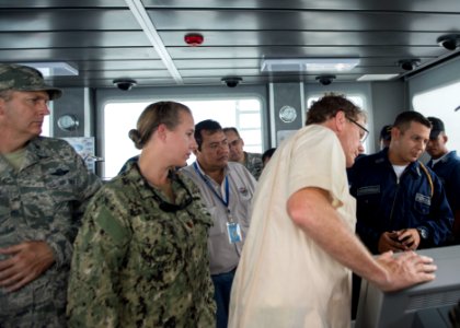 U.S. Ambassador to Honduras James D. Nealon, center right, and other U.S. and Honduran government and military officials tour the Honduran navy patrol boat FNH Morazan (1402) in Puerto Castilla, Honduras, Sept 140901-N-QY430-549