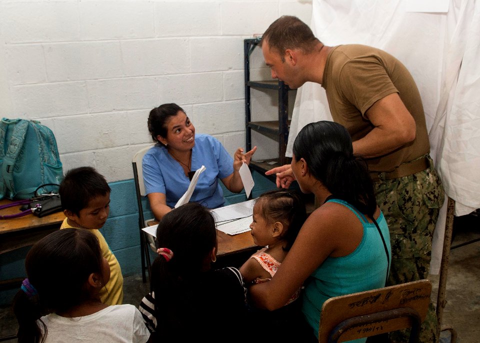 U.S. and Guatemalan service members, Ministry of Education teachers and Ministry of Health doctors and nurses tend to Guatemalan patients at a medical civic action project (MEDCAP) in Puerto Barrios, Guatemala 140823-N-QY430-229