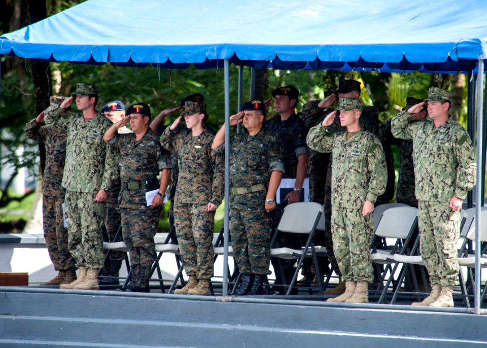 U.S. and Guatemalan service members attend a closing ceremony at the Guatemalan Marine Brigade base in Puerto Barrios, Guatemala, Aug. 22, 2014, as part of Southern Partnership Station (SPS) 2014 140822-N-XQ474-096