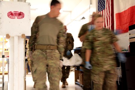 U.S. coalition forces treat Afghan National policeman at FOB Farah 121120-N-IE116-412