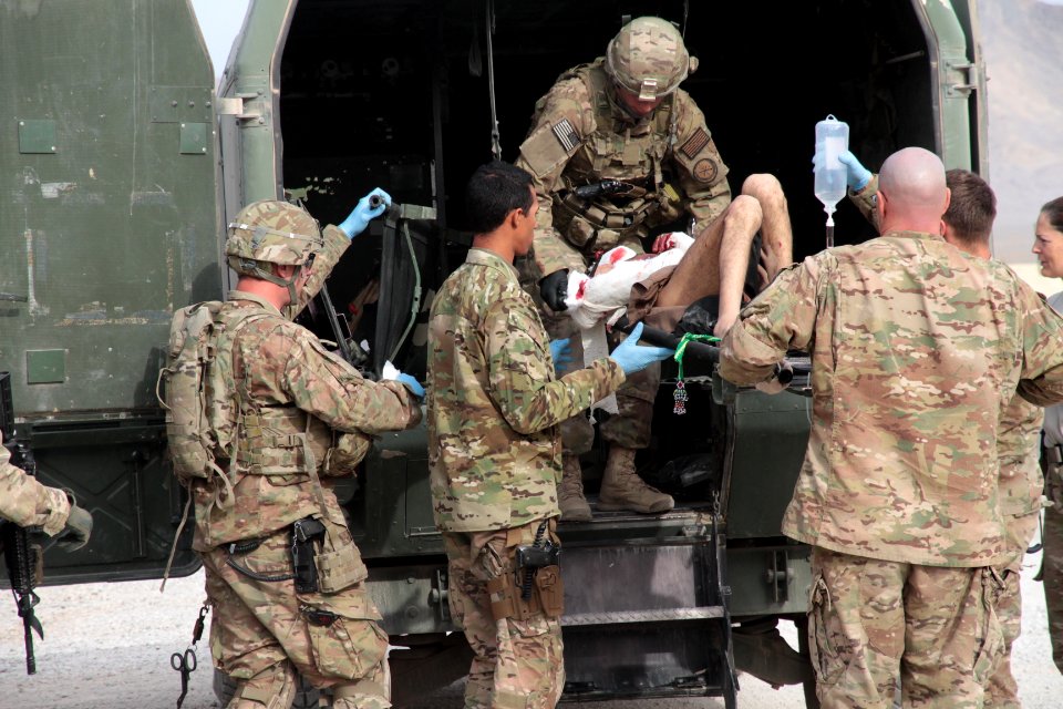 U.S. coalition forces treat Afghan National policeman at FOB Farah 121120-N-IE116-336