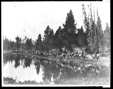 U.S. Geological Survey pack train on trail along the Yellowstone River LCCN95514244
