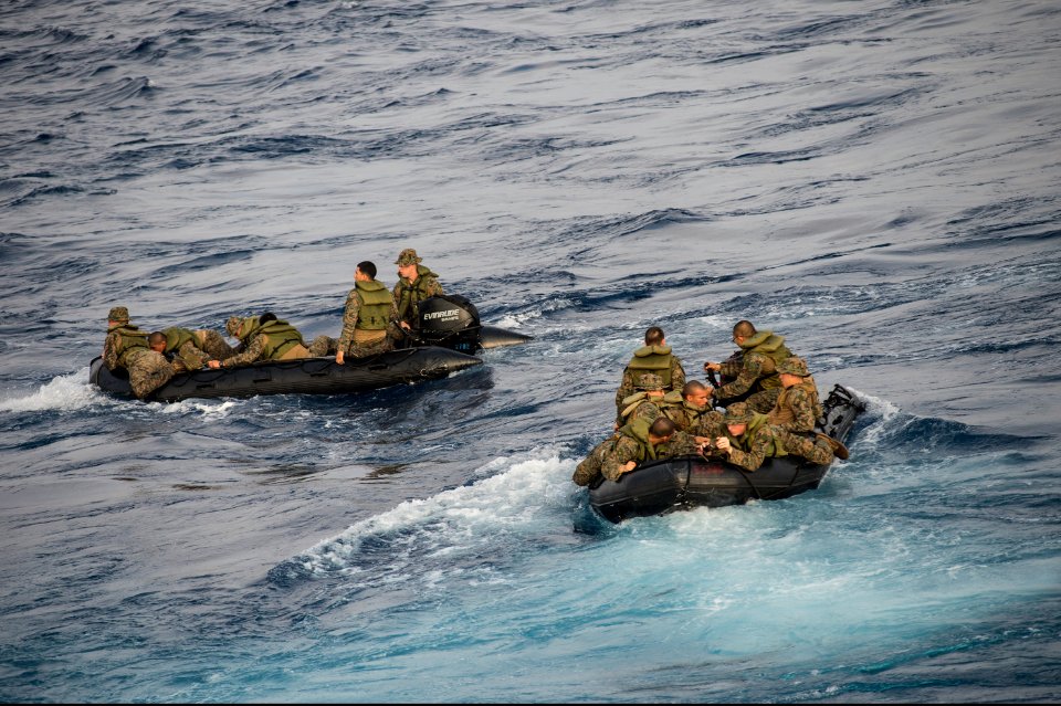 U.S. Marines assigned to Foxtrot Company, Battalion Landing Team, 2nd Battalion, 5th Marine Regiment, 31st Marine Expeditionary Unit conduct launch and recovery operations with combat rubber raiding craft from 140301-N-ZU025-171