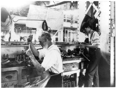 U.S. Naval Gun Factory. Wash. D.C. 2 men working at bench LCCN2004667720