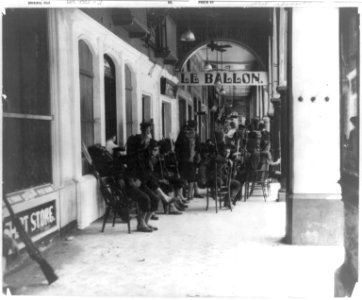 U.S. Naval occupation of Vera Cruz, Mexico- Armed U.S. sailors resting outside Le Ballon hotel LCCN2017645076