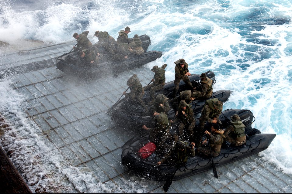U.S. Marines assigned to Foxtrot Company, Battalion Landing Team, 2nd Battalion, 5th Marine Regiment, 31st Marine Expeditionary Unit conduct launch and recovery operations with combat rubber raiding craft from 140301-N-ZU025-013