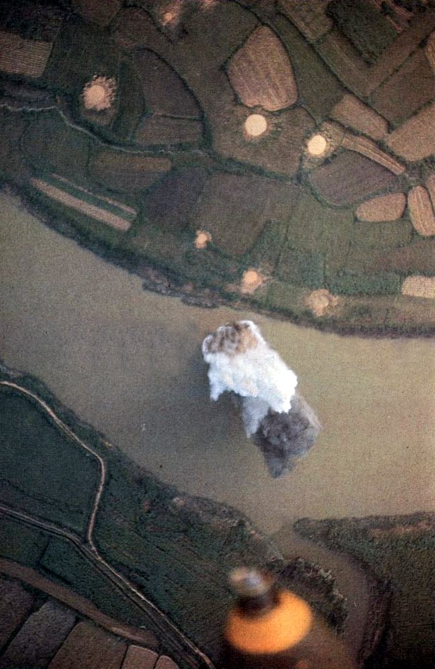 U.S. Navy aircraft attack a target on a river in Vietnam, in 1968