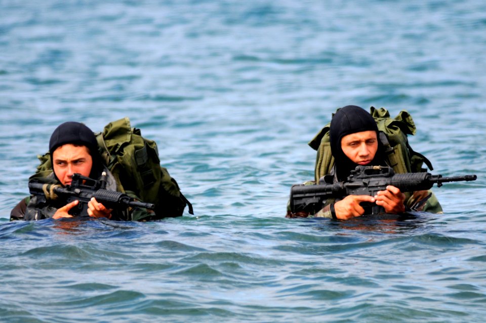 U.S. Sailors exercise in San Clemente Island, Calif., June 24, 2009