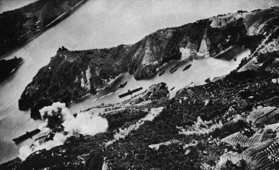 U.S. Navy carrier aircraft attack the Japanese naval base at Kure, Hiroshima, Japan, on 28 July 1945