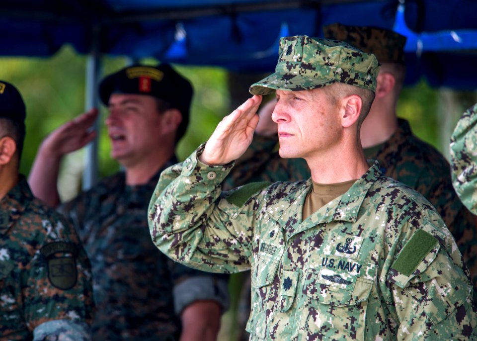 U.S. Navy Cmdr. Jeffrey V. Morganthaler, the commanding officer ashore of Southern Partnership Station (SPS) 2014, salutes during the closing ceremony for SPS 2014 in Puerto Barrios, Guatemala, Aug. 22, 2014 140822-N-XQ474-091