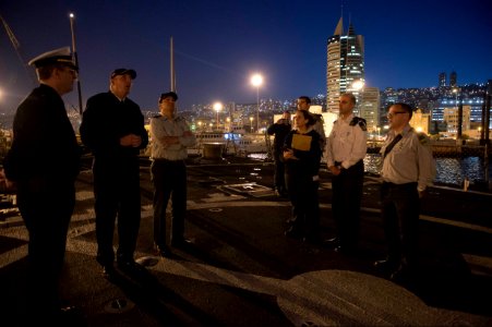 U.S. Navy Cmdr. Robert Alpigini, second from left, the commanding officer of the guided missile destroyer USS Stout (DDG 55), gives Israeli Naval Forces Brig. Gen. Aharon Haliva a tour of the flight deck while 140120-N-UD469-713