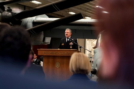 U.S. Navy Capt. Robert A. Hall Jr., at lectern, the commanding officer of the amphibious assault ship USS America (LHA 6), delivers remarks during a reception aboard the ship Aug. 25, 2014, in Valparaiso, Chile 140825-N-LQ799-093