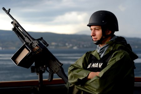 U.S. Navy Cryptologic Technician (Technical) Seaman James Callahan stands watch monitoring outbound civilian merchant traffic aboard the guided missile destroyer USS Ross (DDG 71) in the Dardanelles en route to 140903-N-IY142-136