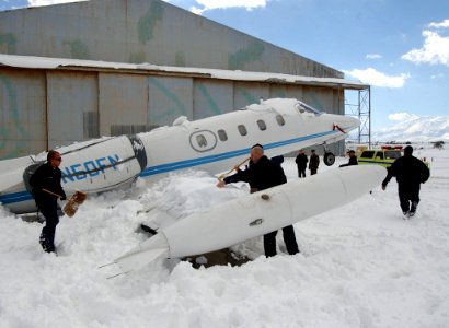 U.S. Navy C-21A Learjet in snow photo