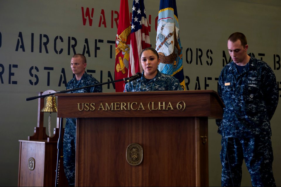U.S. Navy Fire Controlman 3rd Class Jessie Virga, center, recounts her story of Sept 140911-N-MD297-079