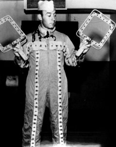 U.S. Navy improved night suit for Landing Signal Officers, in 1953 (USN 628652)