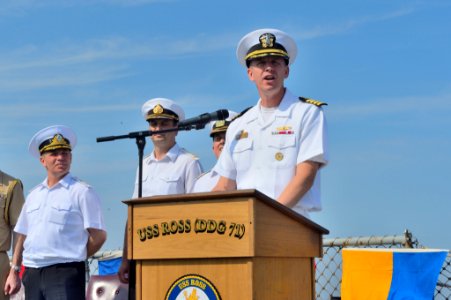U.S. Navy Commodore James Aiken, at lectern, the commander of Destroyer Squadron 60 and the director of exercise Sea Breeze 2014, speaks during the opening ceremony for the exercise aboard the guided missile 140908-N-IY142-185