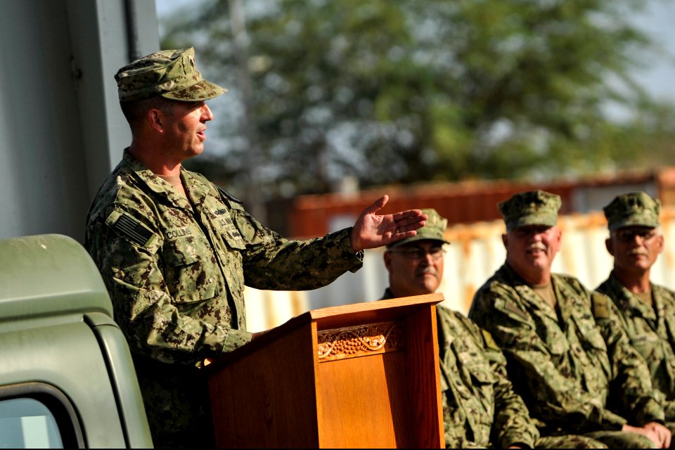 U.S. Navy Cmdr. James Collins, the officer in charge of Coastal Riverine Squadron 1 (Forward), delivers remarks during a transfer of authority ceremony Jan. 17, 2014, at Camp Lemonnier, Djibouti 140117-N-LE393-138