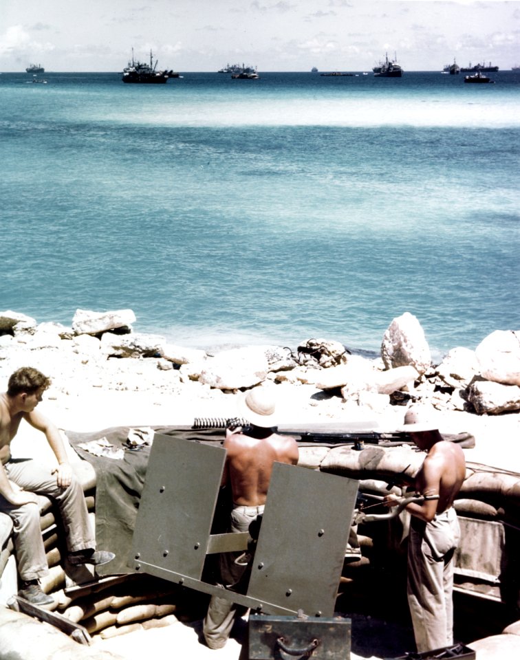 U.S. Navy crewmen clean a 20mm antiaircraft machine gun at Eniwetok atoll, Marshall Islands, circa in 1944 (80-G-K-14847)