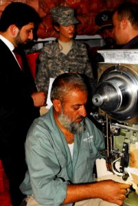 U.S. Navy Rear Adm. Kathleen Dussault tours the Kabul Milli factory (4919577234) photo