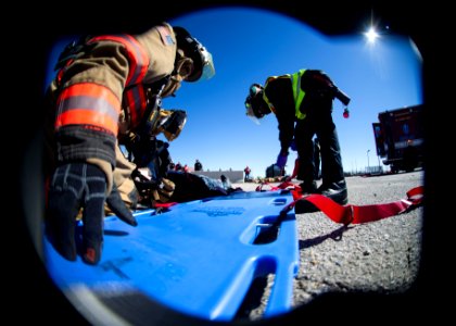 U.S. Navy firefighters treat a simulated casualty Feb. 27, 2014, during a vehicle-borne improvised explosive device response exercise as part of Solid Curtain-Citadel Shield (SC-CS) 2014 at Naval Station 140227-N-XQ474-206