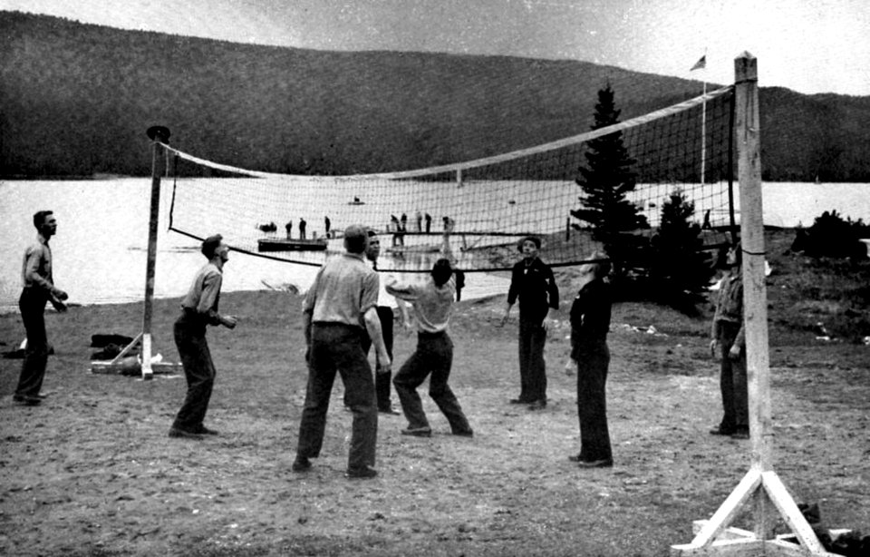 U.S. Navy sailors from USS Tripoli (CVE-64) play volleyball at Naval Station Argentia, Newfoundland, in 1944