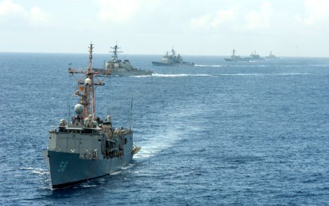 U.S. Navy ships with Destroyer Squadron (DESRON) 26 maneuver into formation while transiting the Atlantic Ocean to Scotland March 19, 2014, in support of exercise Joint Warrior 14-1 140319-N-WX580-211