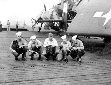 U.S. Navy photographers aboard USS Makin Island (CVE-93), in 1945 (NH 95044)
