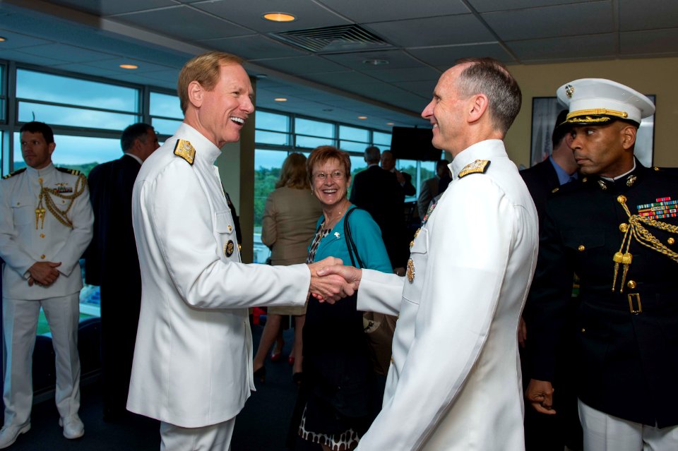 U.S. Navy Vice Adm. Mike Miller, foreground left, the superintendent of the U.S. Naval Academy, welcomes Chief of Naval Operations Adm. Jonathan W. Greenert, foreground right, to the flag bridge May 24, 2013 130524-N-WL435-002