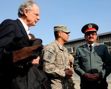 U.S. Rep. Michael N. Castle talks with Afghan Brig. Gen. Khudadad Agah with the assistance of translator U.S. Army Spc. Mohamad Azimi, at the Central Training Facility (4278145153)