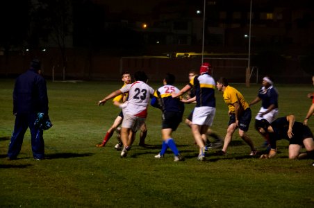 U.S. Sailors and Marines assigned to the amphibious assault ship USS America (LHA 6) and Peruvian sailors play rugby in Callao, Peru, Sept 140901-N-MZ309-165