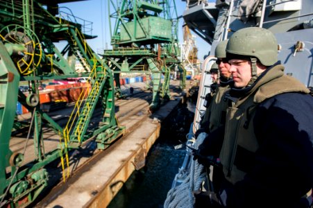 U.S. Sailors assigned to the guided missile destroyer USS Truxtun (DDG 103) stand watch as the ship pulls into Varna, Bulgaria, March 13, 2014 140313-N-EI510-145