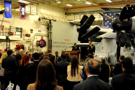 U.S. Navy Rear Adm. Frank L. Ponds, at lectern, the commander of Expeditionary Strike Group 3, speaks during a reception on the amphibious assault ship USS America (LHA 6) in Callao, Peru, Sept 140901-N-LQ799-156